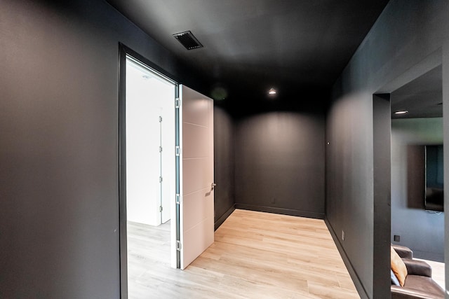 hall featuring light hardwood / wood-style floors