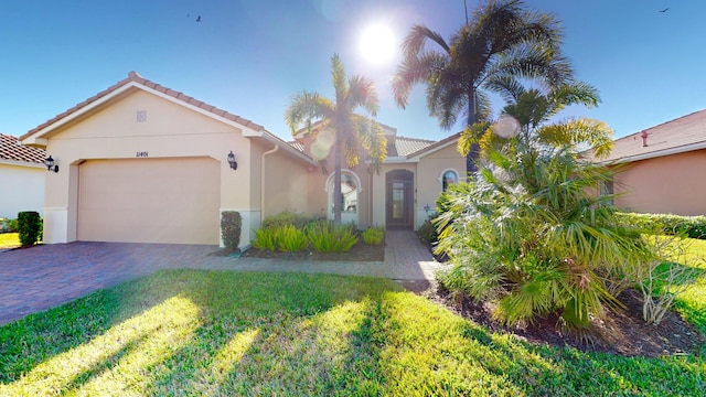 view of front of property with a garage