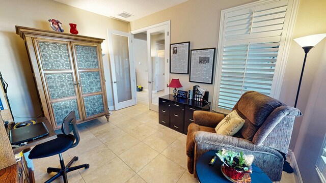 tiled office with french doors