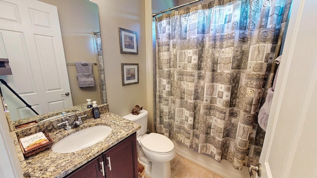 full bathroom featuring tile patterned flooring, shower / tub combo, vanity, and toilet