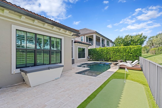 view of pool with a patio area and a jacuzzi