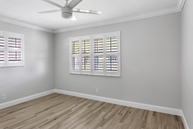 empty room featuring crown molding, ceiling fan, and light wood-type flooring