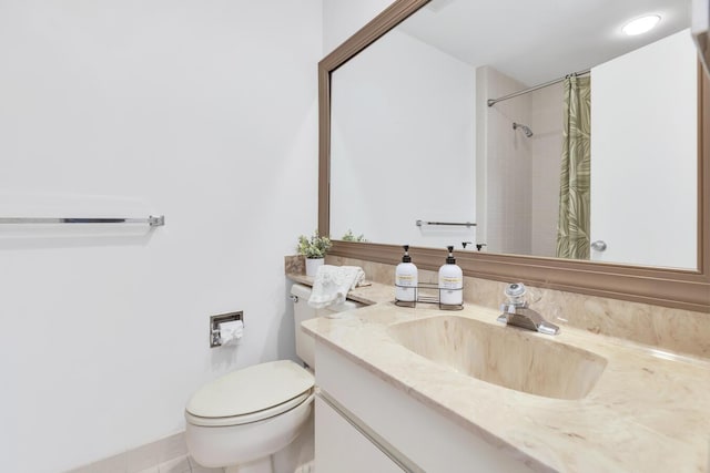 bathroom with tile patterned flooring, vanity, toilet, and curtained shower