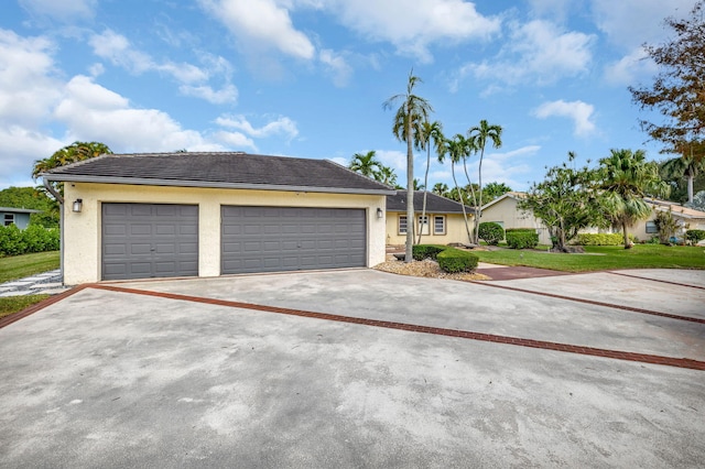 ranch-style home with a garage