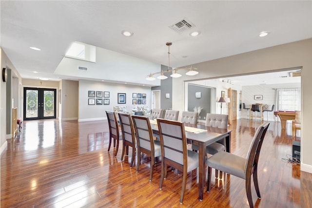 dining space featuring french doors, dark hardwood / wood-style floors, and pool table