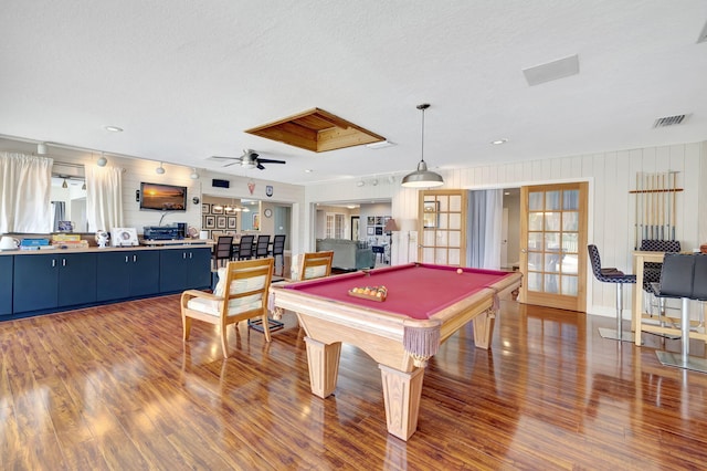 playroom featuring ceiling fan, wood-type flooring, a textured ceiling, and pool table