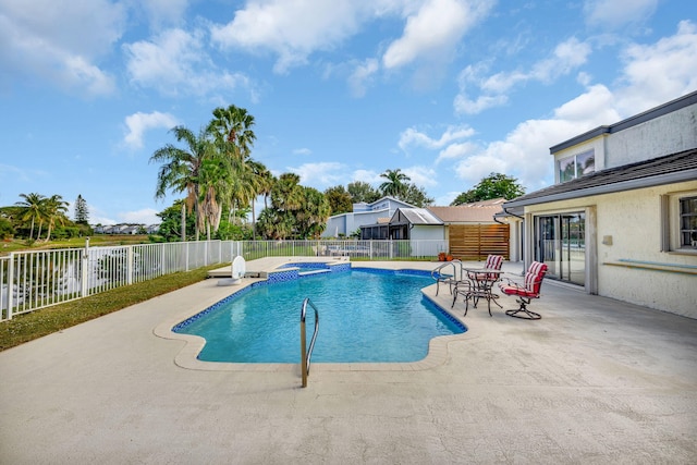 view of pool featuring a patio area