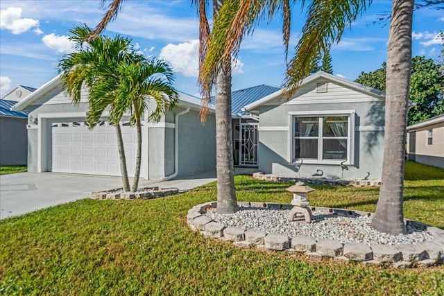 ranch-style home with a garage and a front yard