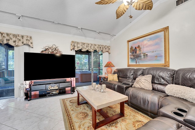 living room featuring ceiling fan, vaulted ceiling, ornamental molding, and a textured ceiling