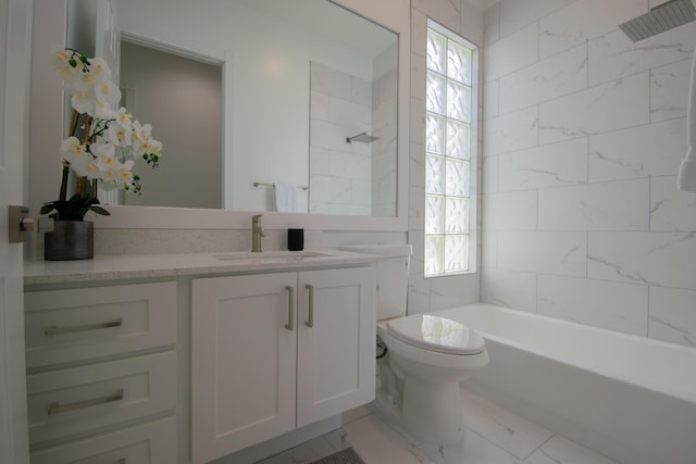 full bathroom featuring toilet, marble finish floor, and vanity