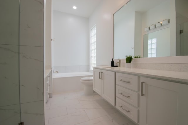 bathroom featuring marble finish floor, a marble finish shower, recessed lighting, vanity, and a bath