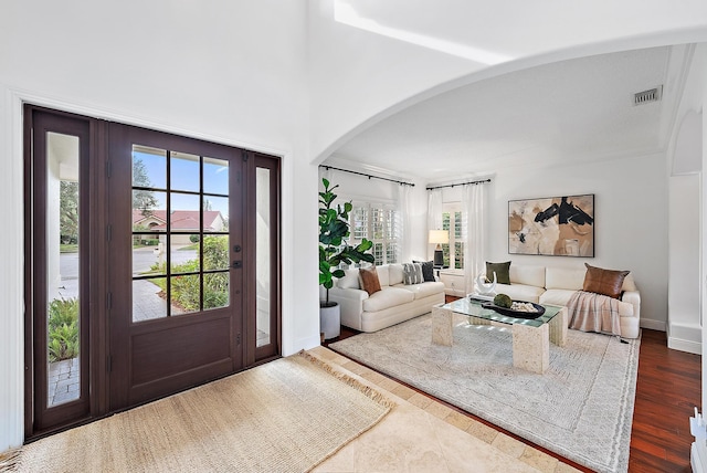 living room with dark hardwood / wood-style flooring