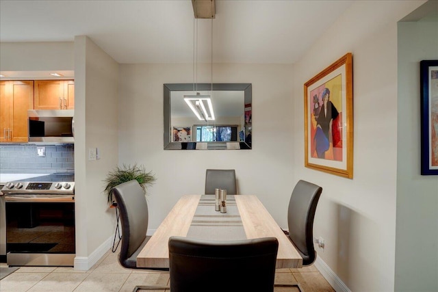 view of tiled dining space