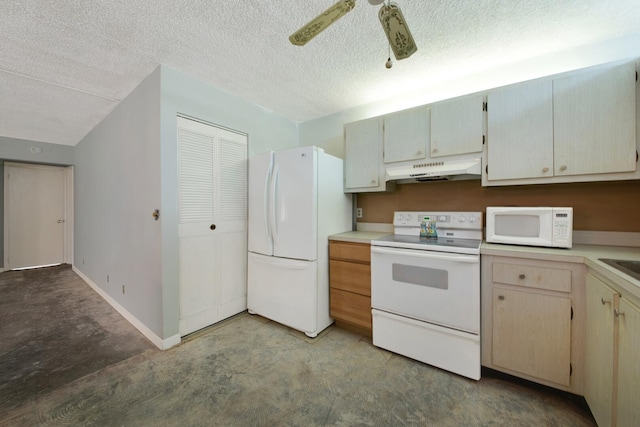 kitchen featuring a textured ceiling, ceiling fan, and white appliances