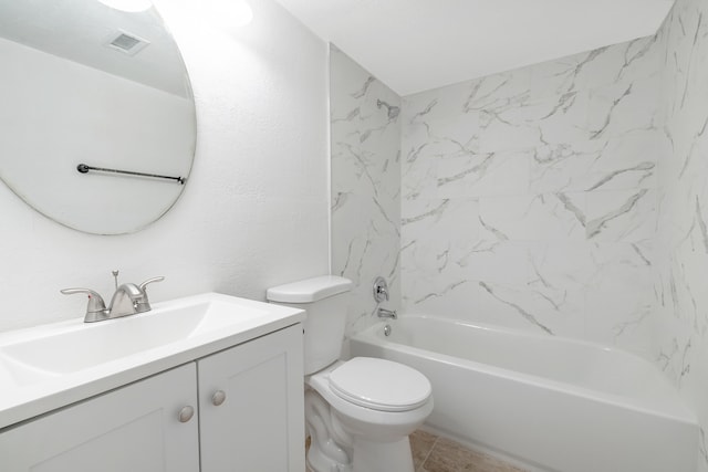 full bathroom with vanity, toilet, and tiled shower / bath combo