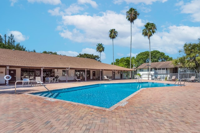 view of swimming pool featuring a patio