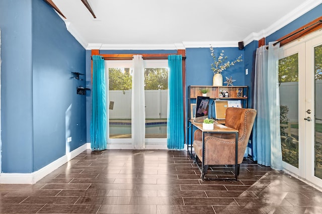 interior space with crown molding and french doors