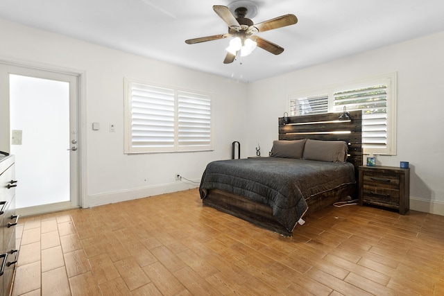 bedroom featuring ceiling fan and light hardwood / wood-style flooring