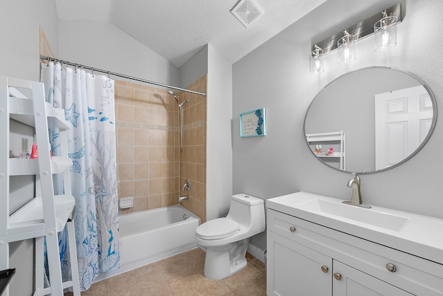 full bathroom featuring tile patterned flooring, vanity, toilet, shower / bathtub combination with curtain, and a textured ceiling