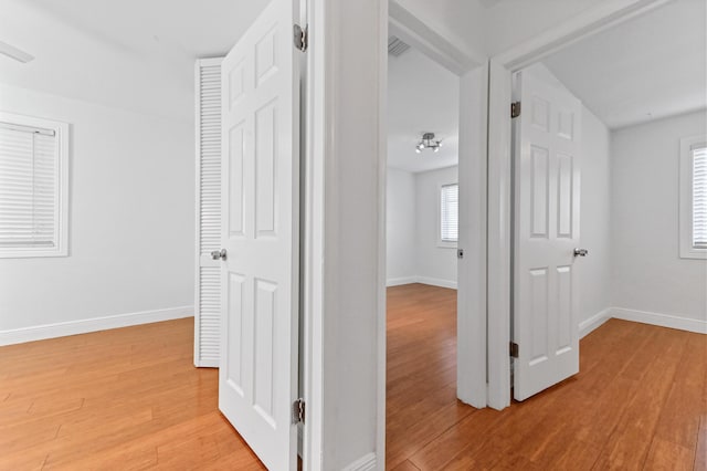 hallway featuring light hardwood / wood-style floors