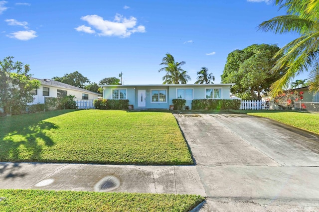 single story home with a front yard