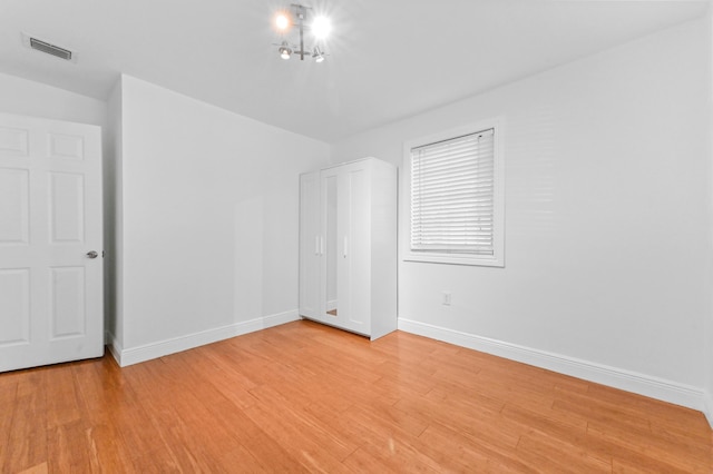 unfurnished bedroom featuring light hardwood / wood-style flooring