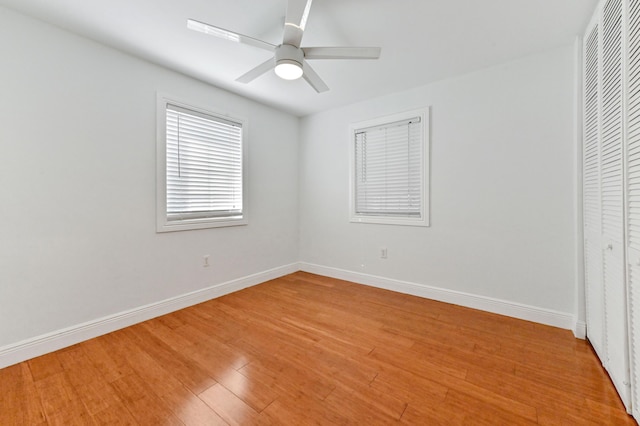 unfurnished bedroom featuring ceiling fan and light hardwood / wood-style flooring