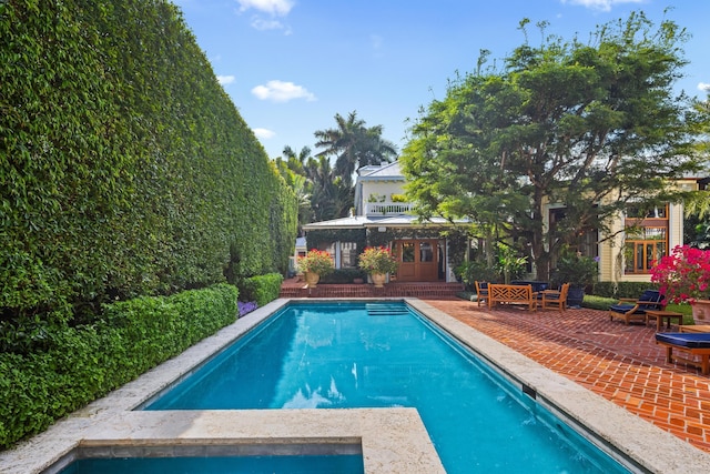 view of pool featuring a patio