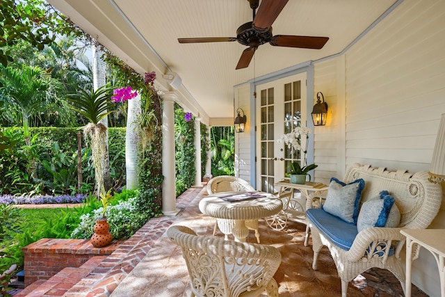 view of patio with french doors and ceiling fan