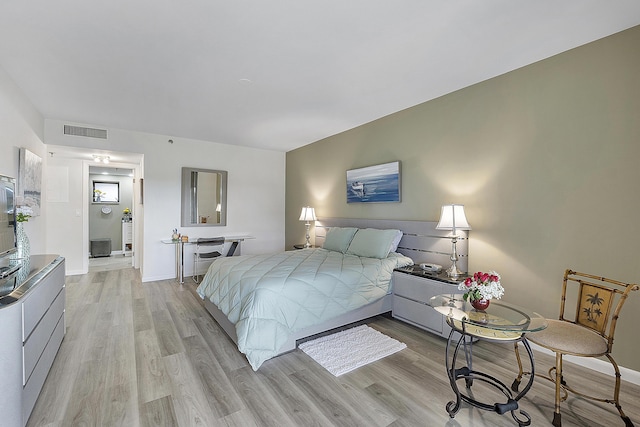 bedroom featuring light hardwood / wood-style floors