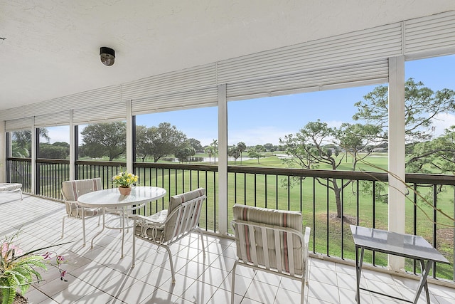 unfurnished sunroom with a wealth of natural light