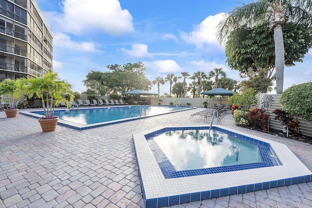 view of pool featuring a patio