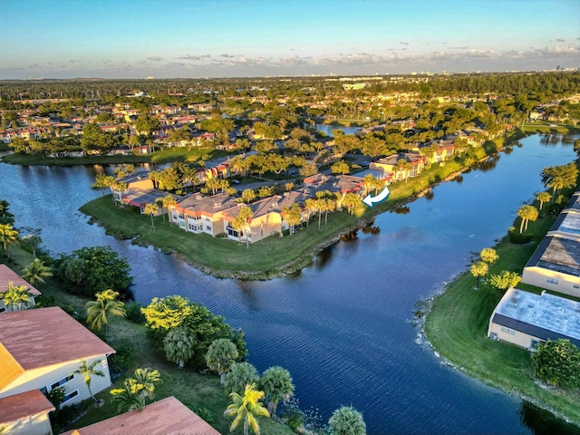 birds eye view of property featuring a water view