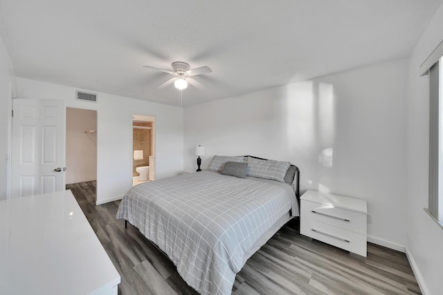 bedroom featuring ceiling fan and dark hardwood / wood-style flooring