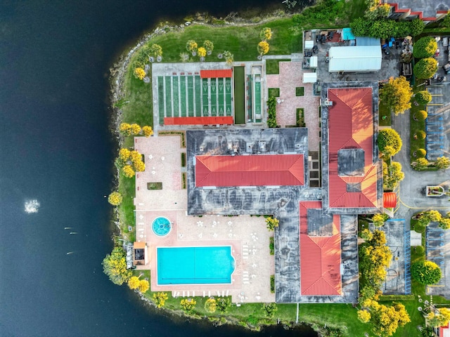 bird's eye view with a water view