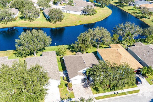 bird's eye view with a water view