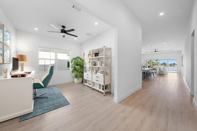 office area featuring ceiling fan and light hardwood / wood-style floors