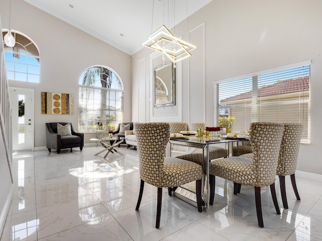 living room with ceiling fan and crown molding