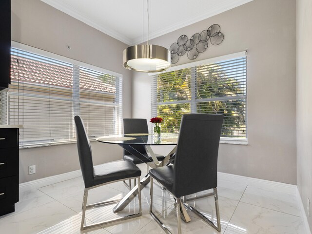 living room with ceiling fan and ornamental molding