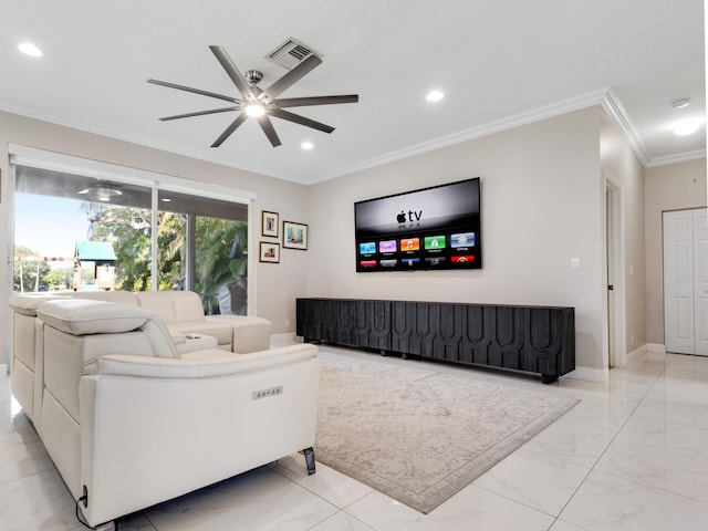 living room with crown molding and ceiling fan