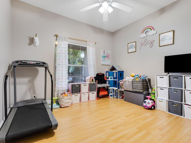 rec room featuring hardwood / wood-style floors and ceiling fan