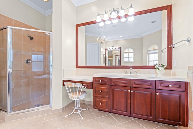 bathroom featuring tile patterned flooring, vanity, a shower with door, and crown molding