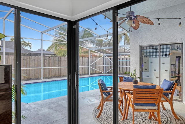 view of swimming pool with ceiling fan