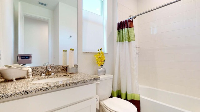 full bathroom with vanity, toilet, and shower / bathtub combination with curtain