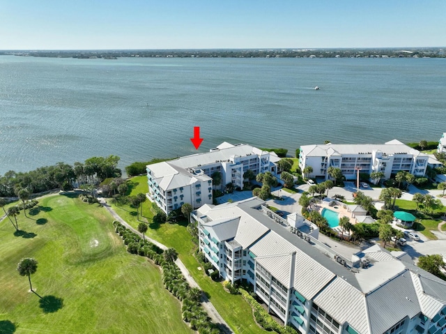 drone / aerial view with a water view