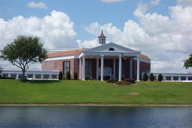 view of building exterior featuring a water view