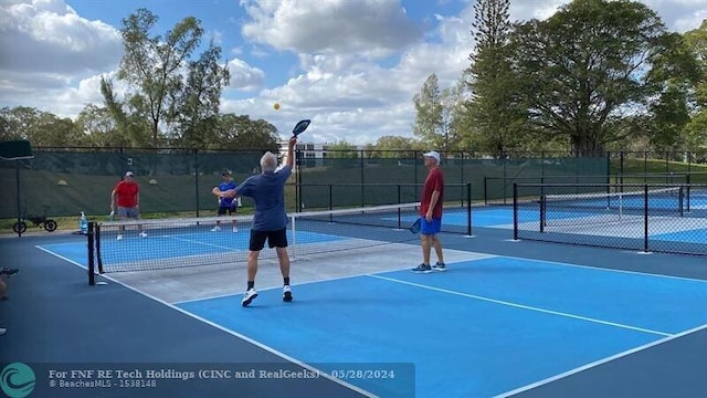 38 Farnham B, Deerfield Beach, FL 33442 - view of tennis court with fence