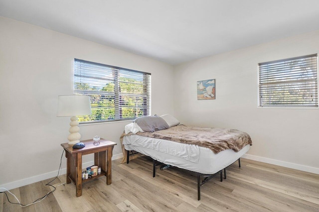 bedroom featuring light wood-type flooring