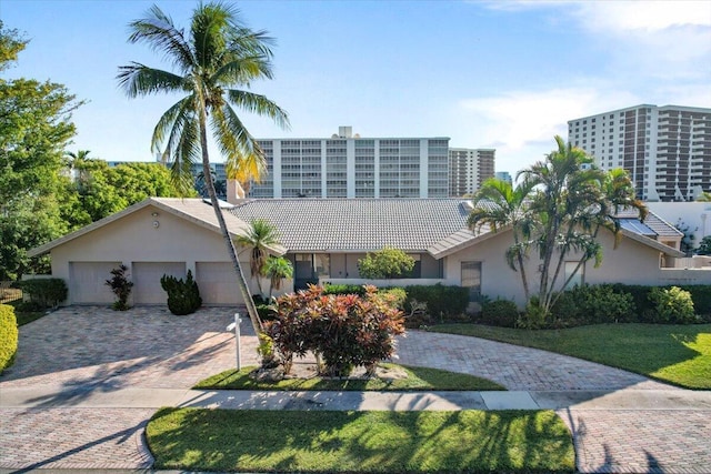 view of front of property featuring a garage