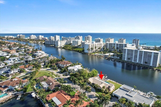 drone / aerial view with a water view